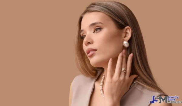 Woman wearing pearl earrings and a matching necklace