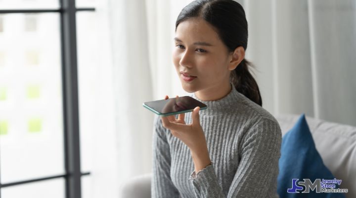 Woman using smartphone for voice search and messaging